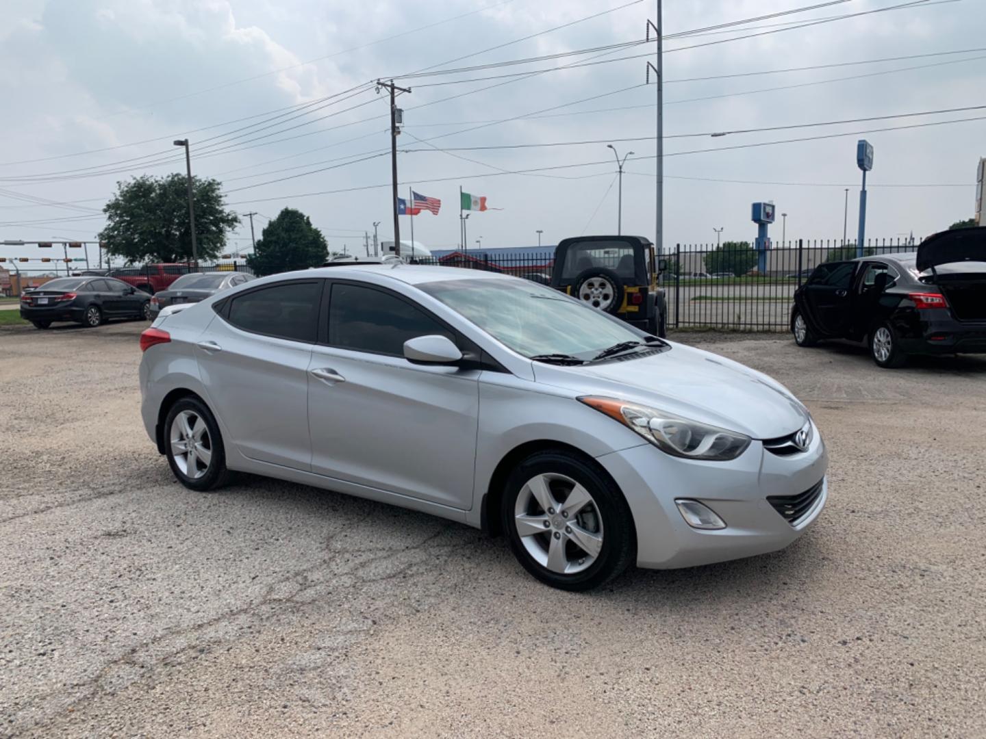 2013 Silver /Black Hyundai Elantra (5NPDH4AE1DH) with an 4 Cylinders E 1.8L MFI DOHC 110 engine, AUTOMATIC transmission, located at 1830 North Belt Line Road, Irving, TX, 75061, (469) 524-0199, 32.834373, -96.993584 - Photo#6